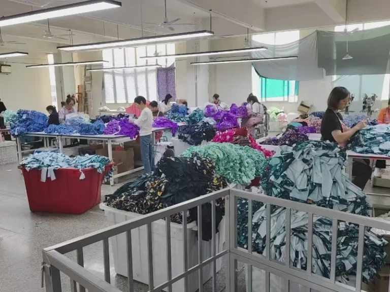 In-house QC team inspecting custom garments